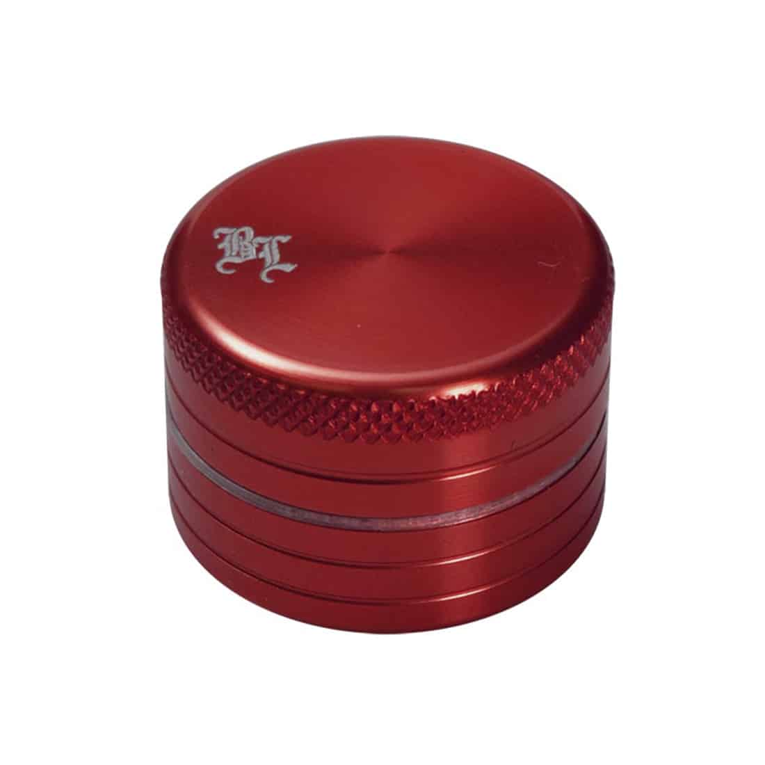 En sort væggrinder med en glat overflade og en rund form. Den har en diameter på 29 mm og består af to dele, der er adskilt af en lille spalte. Grinderen prydes af et enkelt, stiliseret bladdesign i rød, der står i kontrast til den sorte baggrund. Kanten er let afrundet, hvilket giver et strømlinet udseende.