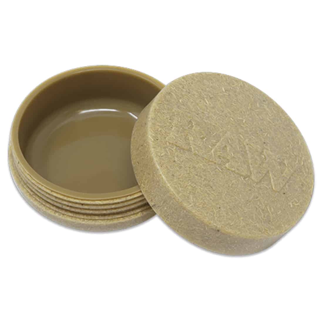 En transparent, cylindrisk opbevaringsbeholder med en skruelåg i metal. Beholderen har en glat overflade og er lavet af klart glas. Låget er i en dyb, mørkeblå farve med en mat finish, der står i kontrast til den klare glasstruktur. Indholdet er synligt gennem glasset og skaber en minimalistisk æstetik.