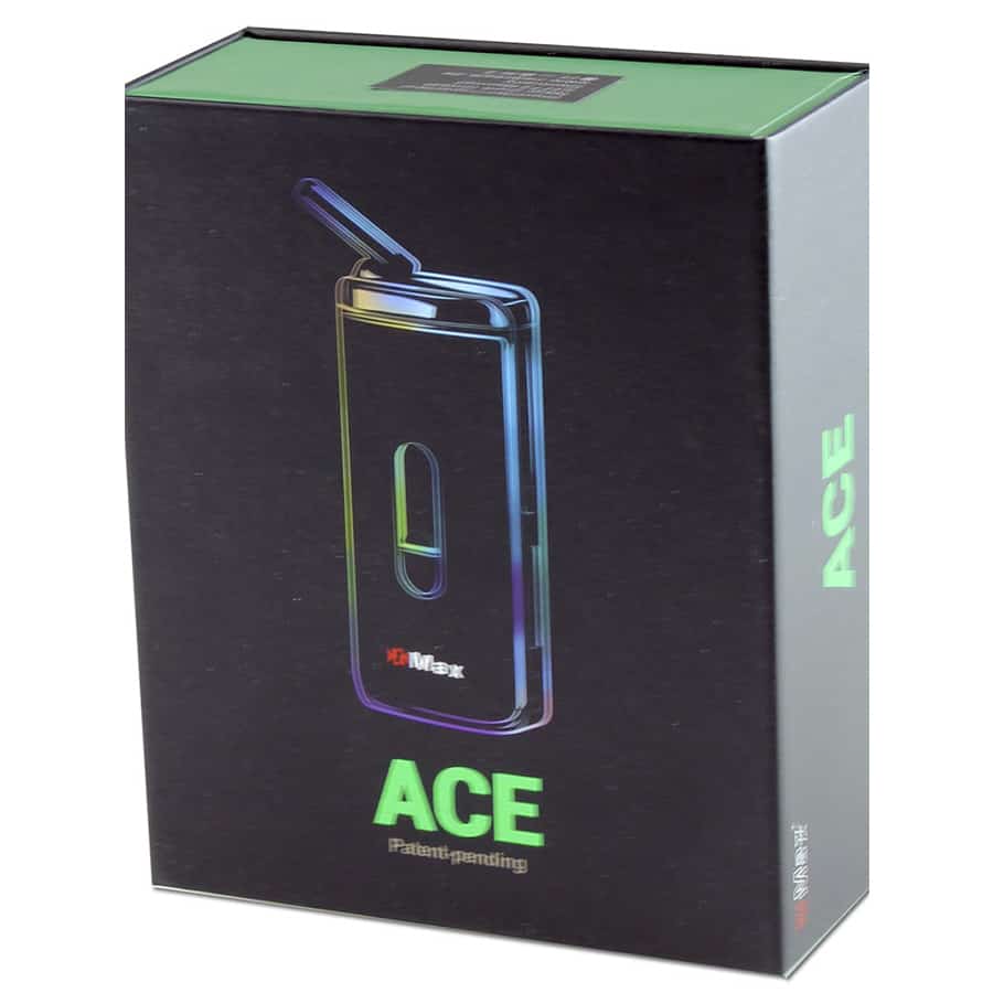 En brun vaporizer med en glat overflade og en let mat finish. Den har en ergonomisk form med afrundede kanter og en sort knap placeret centralt. En lille digital skærm viser temperaturindstillinger, og der er et luftindtag øverst. En diskret logo- eller mærkemarkering findes på siden, hvilket tilføjer til det moderne design.