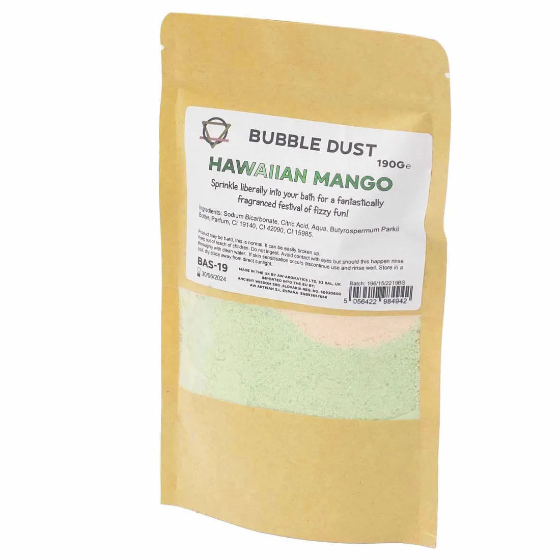 En transparent krukke indeholder et gyldent, kornet pulver med en let glitrende overflade. Teksturen virker let og luftig, mens farven har nuancer af solgul og orange. Etiket med sort tekst pryder krukkens front, hvor produktnavnet fremhæves. Korklåg topper beholderen, som står på en lys overflade, hvilket fremhæver indholdets farver.