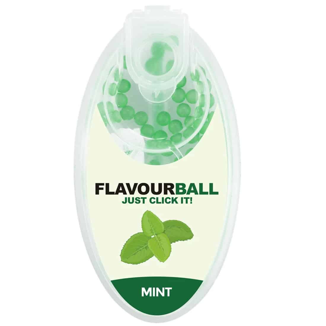 En rund, transparent beholder indeholder små, farverige kugler i nuancer af grøn og hvid. Kuglerne har en glat overflade og varierer i størrelse. Beholderen har en skruehætte med en praktisk klikfunktion, der er designet til nem adgang. Etiket på beholderen præsenterer information med tydelig tekst og grafik, der angiver indholdet.