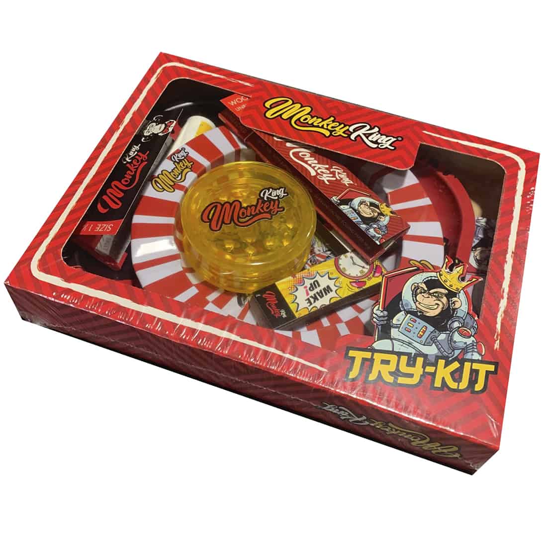 Et sæt bestående af flere dele i forskellige nuancer af grøn, brun og guld. Inkluderer en formet figur af en abe med detaljerede ansigtstræk og en glat overflade. Der er også et sæt værktøjer i metal, der har en blank finish og skarpe kanter. Elementerne præsenteres på en hvid baggrund, der fremhæver farverne og detaljerne.