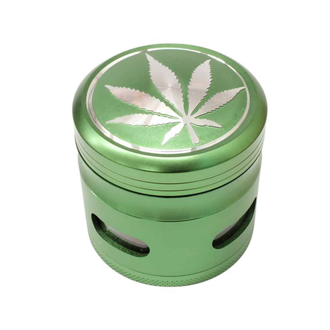 En grøn vinkelsliber pryder midten af kompositionen, med en robust, slank krop fremhævet af en mat overflade. Håndtaget er ergonomisk formet og fremstår i sort plast, hvilket skaber kontrast til den grønne farve. Den runde slibeskive, der kan ses foran, har en grålig nuance, mens knapperne og symbolerne er placeret på siden af enheden.