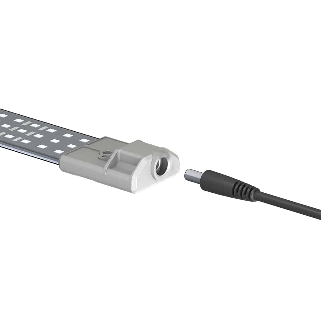 En sort LED-strømforsyning præsenteres med en glat overflade og afrundede kanter. Den har to udgange med tydelige, sorte terminaler. På den ene side findes en lille, hvid tekst med tekniske specifikationer, mens den anden side har et ventilationsgitter. Strømforsyningen er designet til at være kompakt og funktionel, ideel til installationsbrug.