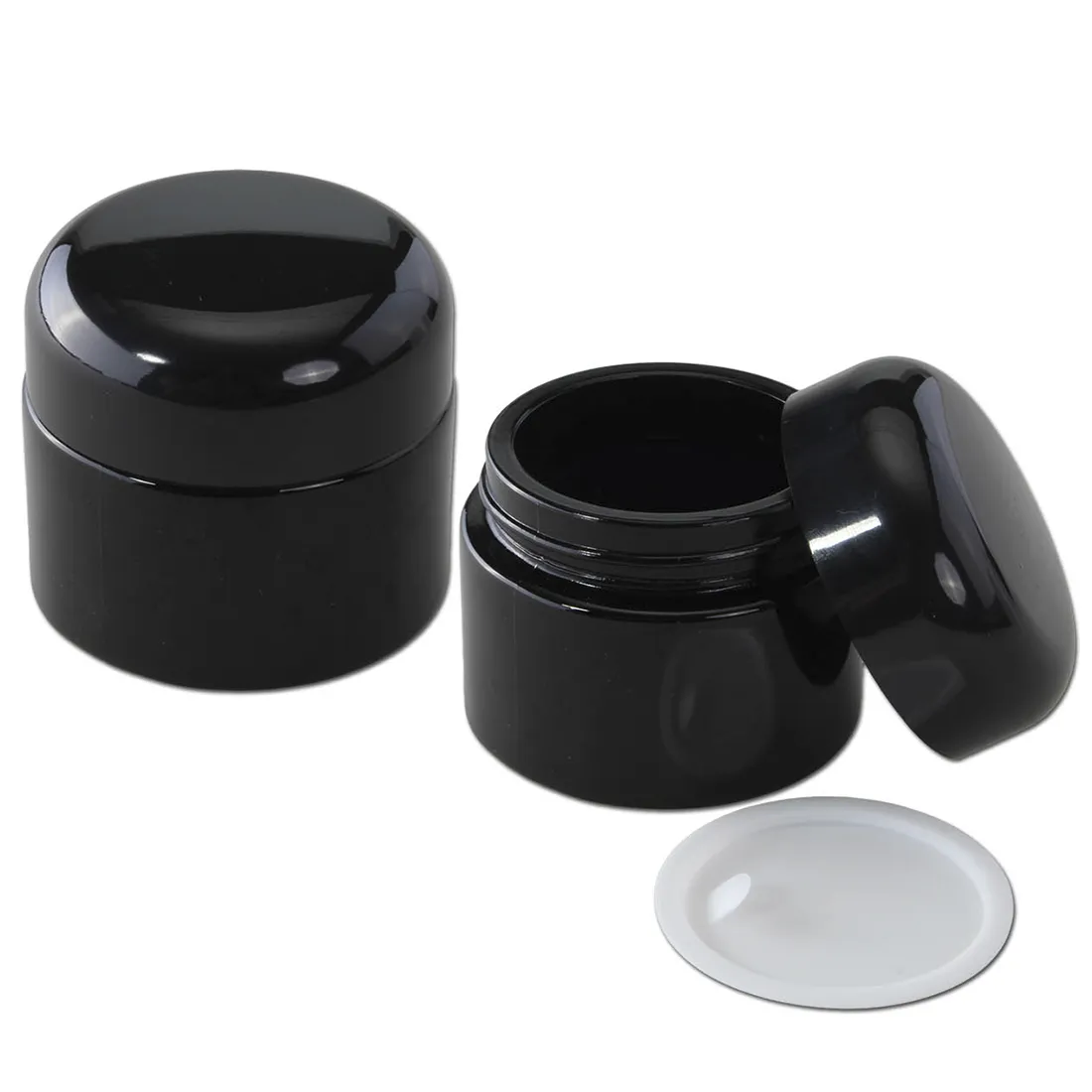 En violet glasbeholder med en bred åbning og en glat overflade. Beholderen har en cylindrisk form med en let afsmalnet bund. Den gennemsigtige violet farve skaber et elegant udseende, mens glasets glans giver en fin refleksion af lys. Beholderen har en kapacitet på 50 ml og fremstår simpel og stilren uden ekstra dekoration.