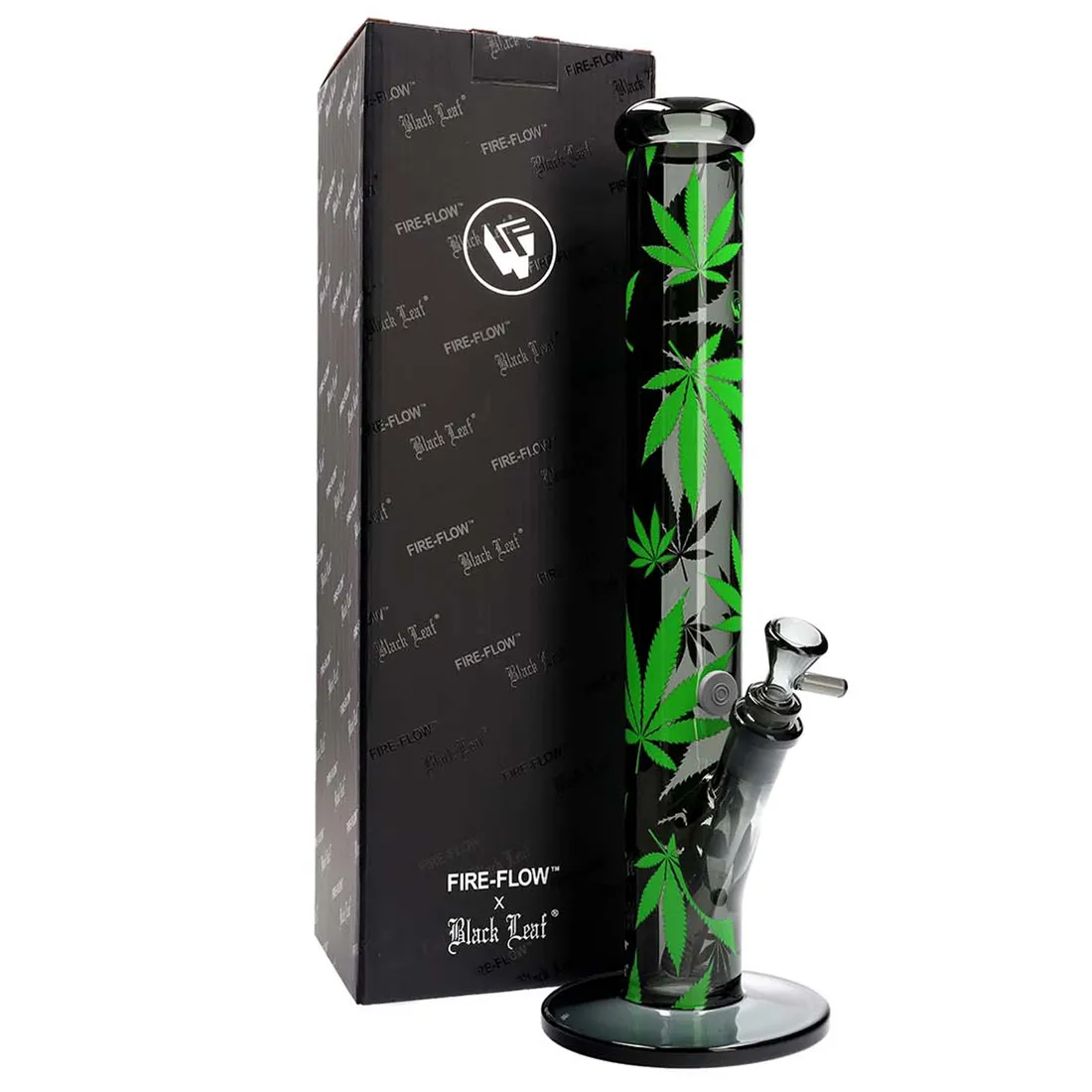 En rund plantekrukke med en dyb, sort overflade står centralt. Den er lavet af keramik, hvilket giver en glat og skinnende tekstur. Over kanten hænger grønne blade fra en indendørs plante, der tydeligt har en livlig farve. Blade har en blank finish med tydelige nerver og en let buet form, hvilket skaber en naturlig kontrast til den sorte krukke.