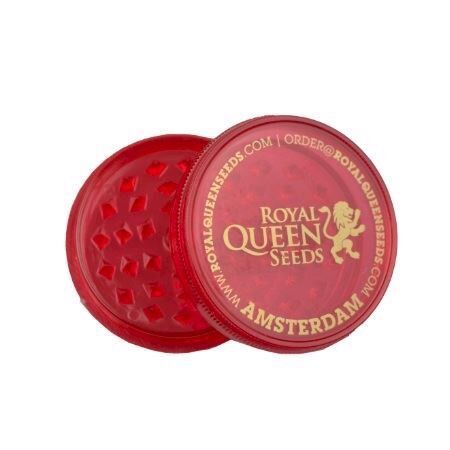 En akryl grinder præsenterer sig i en dyb rød farve med en glat, skinnende overflade. Den er cylindrisk med en let afrundet top og en tætsiddende låg, der har små, skarpe tænder indvendigt til at male urter. På siden er der en diskret, indgraveret logo og et mønster, der tilføjer strukturel interesse.