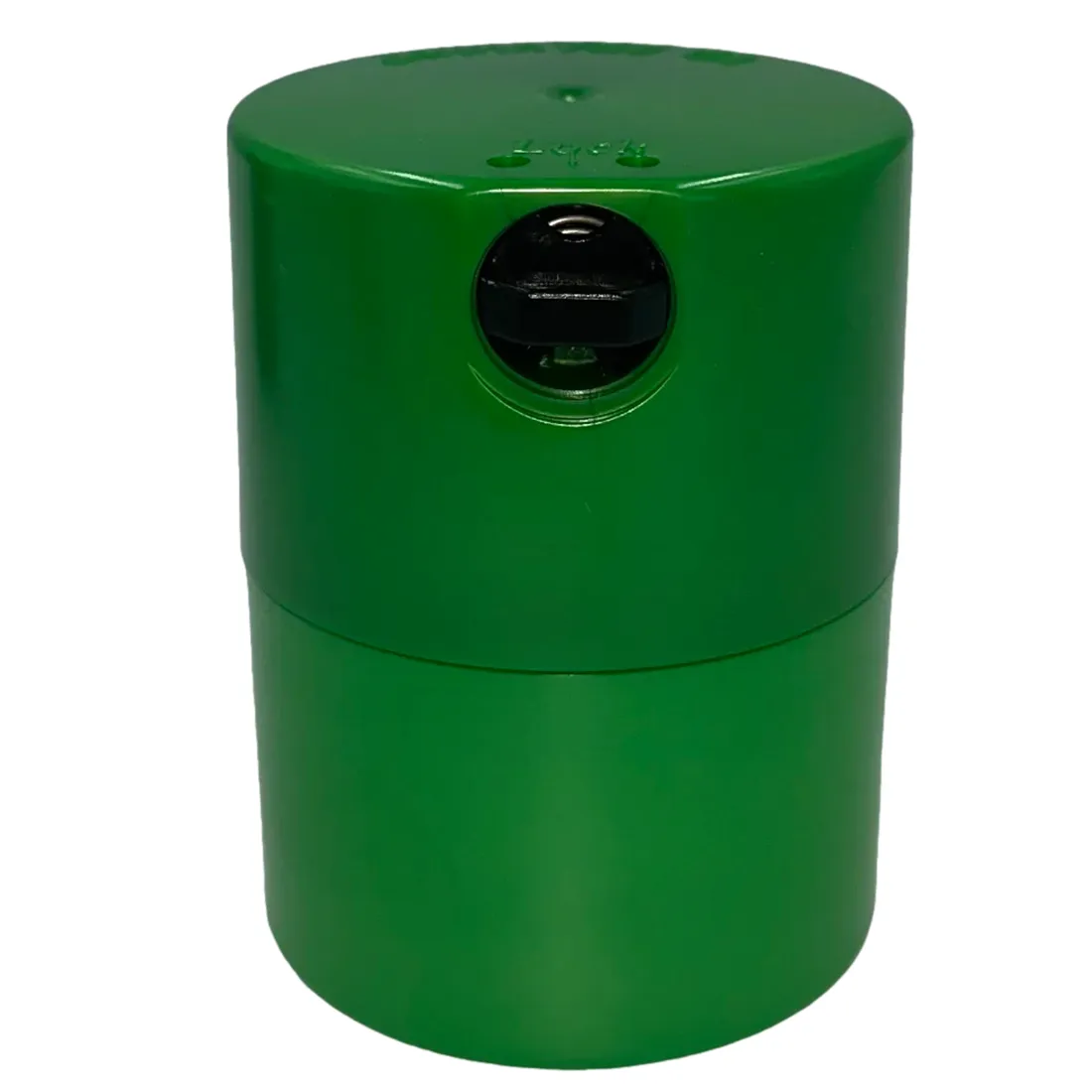 En lysegrøn, cylindrisk beholder med en glat overflade og en let mat finish. Beholderens låg er skruefast og har en let buet form. Den har en kapacitet på 290 ml og er forsynet med en lille, tydelig etikette på siden. Farven fremstår frisk og moderne, hvilket giver et minimalistisk udtryk.