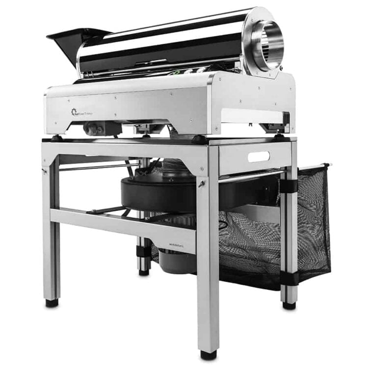 En automatisk trimmer præsenterer sig i en sort og sølvfarvet farvekombination med glatte, strømlinede former. Den har en rund skærehoved med skarpe blade synligt i midten, omgivet af en beskyttende ramme. En betjeningsknap findes på siden, mens håndtaget er ergonomisk designet med en matte overflade, der sikrer et godt greb.