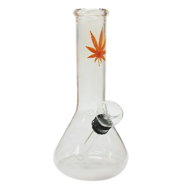 En lille, orange figur med en glat, rund form og bløde kurver. Overfladen har en blank finish, hvilket giver en livlig glans. Figurens ansigt har store, runde øjne og et smilende mund, der tilføjer en legende karakter. Der er små detaljer som næse og knapper, der bryder den ensartede farve. Størrelsen er kompakt, cirka 15 cm høj.