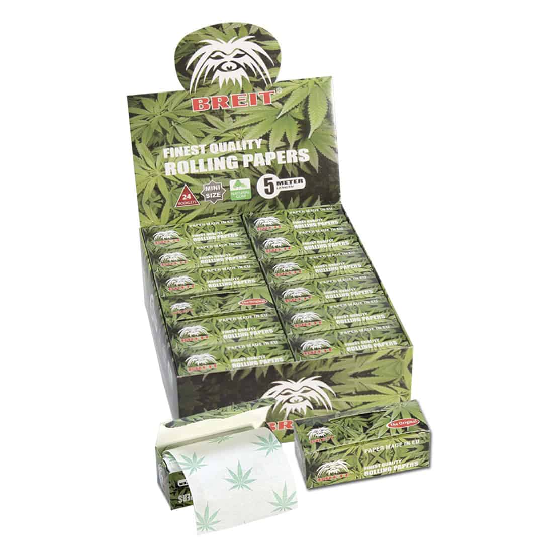 Metrisk papir rulles ud, prydet med tydelige, sorte centimeter- og tommemærker på en hvid baggrund. De præcise linjer skaber et struktureret mønster, der strækker sig over hele papiret. I den øverste del ses en række små, sorte cirkler, der markerer opdelinger. Papirrets glatte overflade reflekterer lys, hvilket fremhæver skarpheden i de trykte tal og linjer.