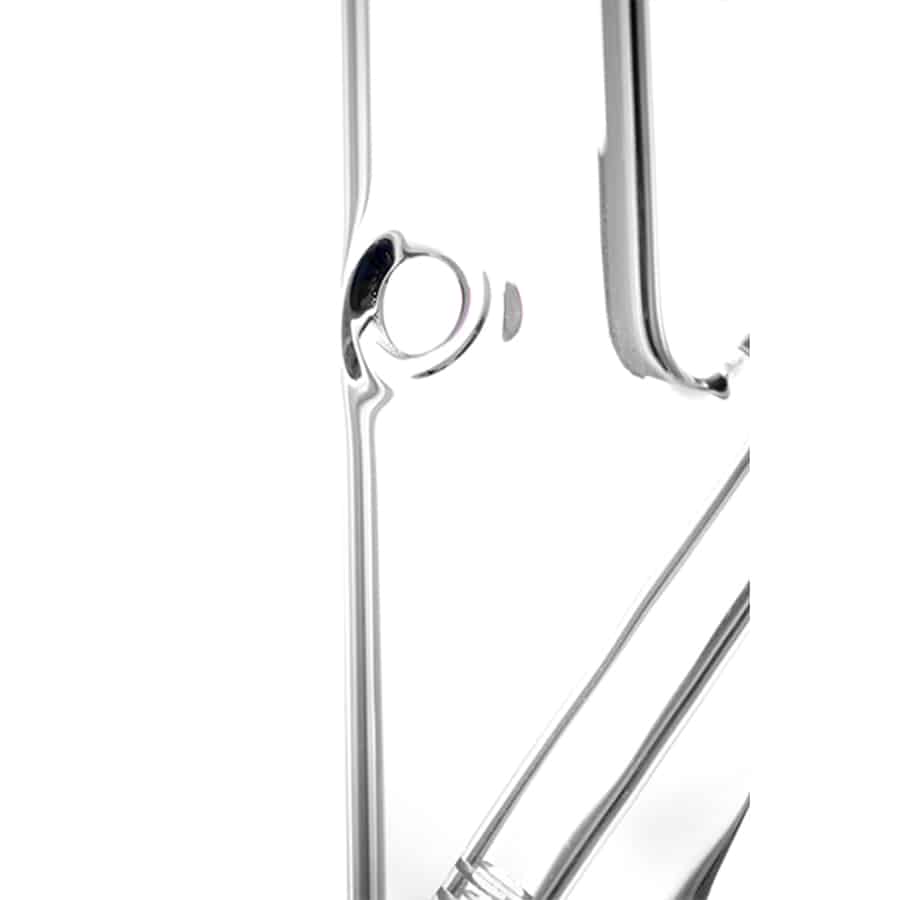 En stor, sort og sølvfarvet brænder med en cylindrisk form dominerer billedet. Den har en glat, metaloverflade med en blank finish, der reflekterer lys. Øverst er der en justerbar ventil med en ringformet greb. Brænderen står på en flad, mørk overflade, hvilket fremhæver dens elegante design og robuste konstruktion.