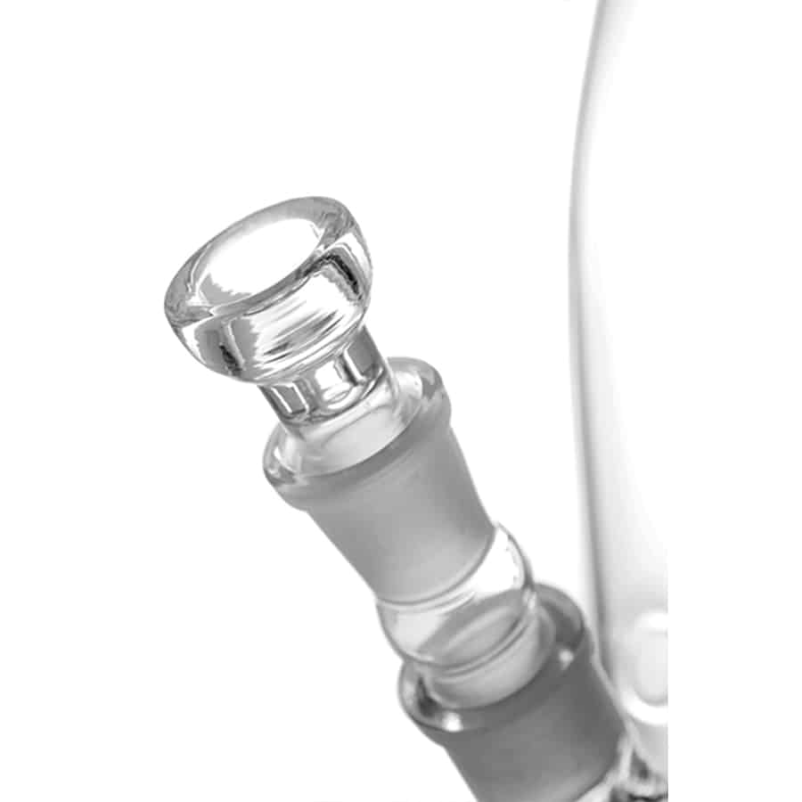 En sort, firkantet enhed med afrundede kanter pryder overfladen. Den har en glat, mat finish og er udstyret med en stor, cirkulær brænder i midten, der har et metalnet som beskyttelse. Knapperne er placeret på fronten, med tydelige symboler og markeringer. Under enheden er der en stabil base, der giver støtte.