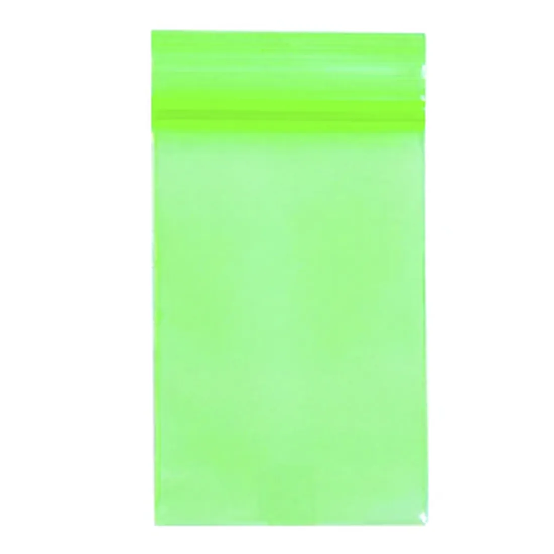 En grøn zip-lock taske præsenteres med en størrelse på 40 x 60 mm. Tasken er gennemsigtig, hvilket giver mulighed for at se indholdet. Lukningen er en praktisk zip-funktion, der sikrer tæthed. Overfladen er glat med en let skinnende finish, og tasken har en simpel, funktionel form uden ekstra dekorationer eller tekst.